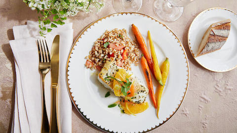 overhead view of plated catering dinner on gold rimmed plate