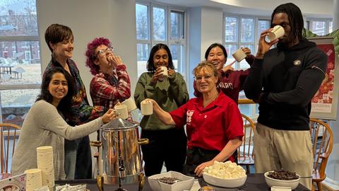 Bela and students having hot chocolate